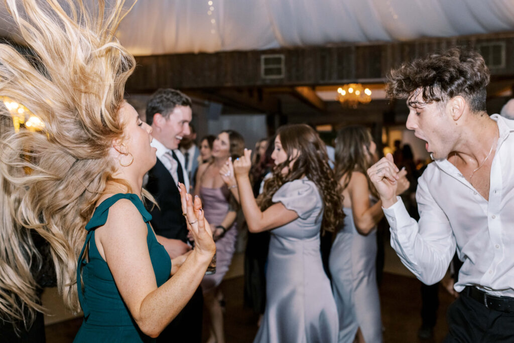 Dancing at a Calamigos Ranch Oak Room Wedding Reception. Copyright - Lisa Leanne Photography, California