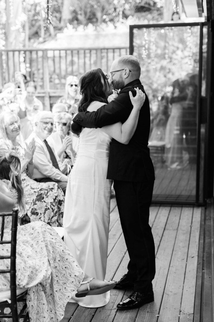 Calamigos Ranch Birchwood Room Reception Bride and Groom Kiss