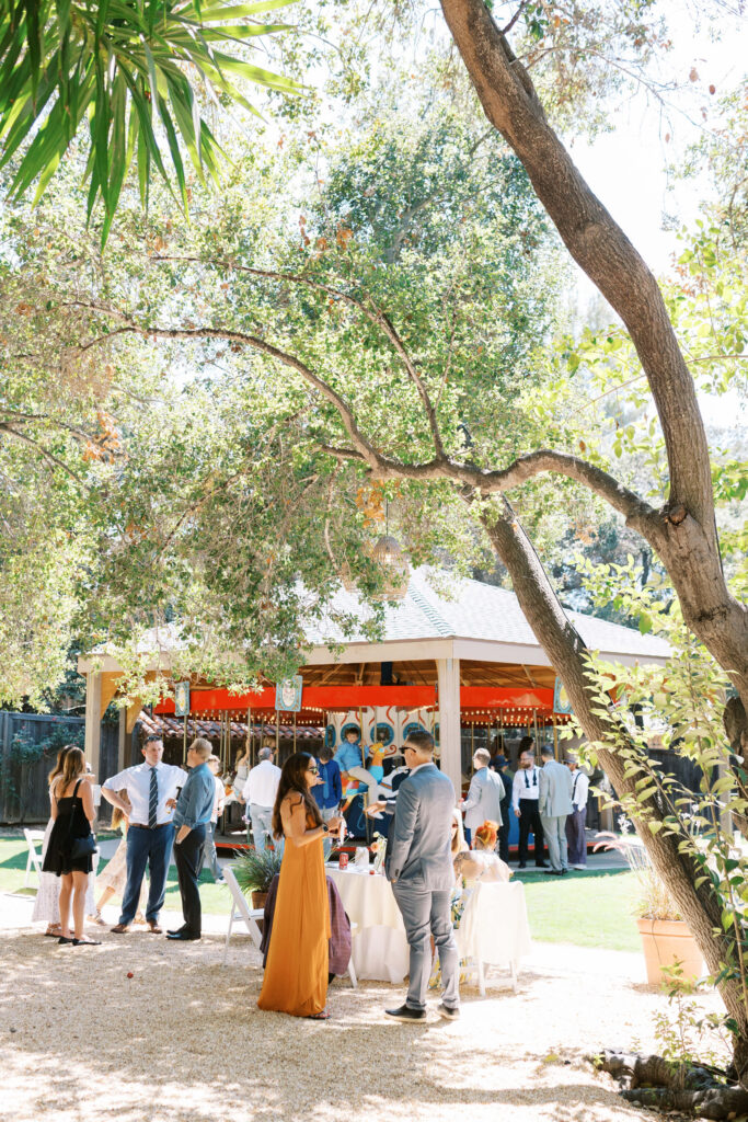Guests on Carousel at Calamigos Ranch Brunch Wedding
