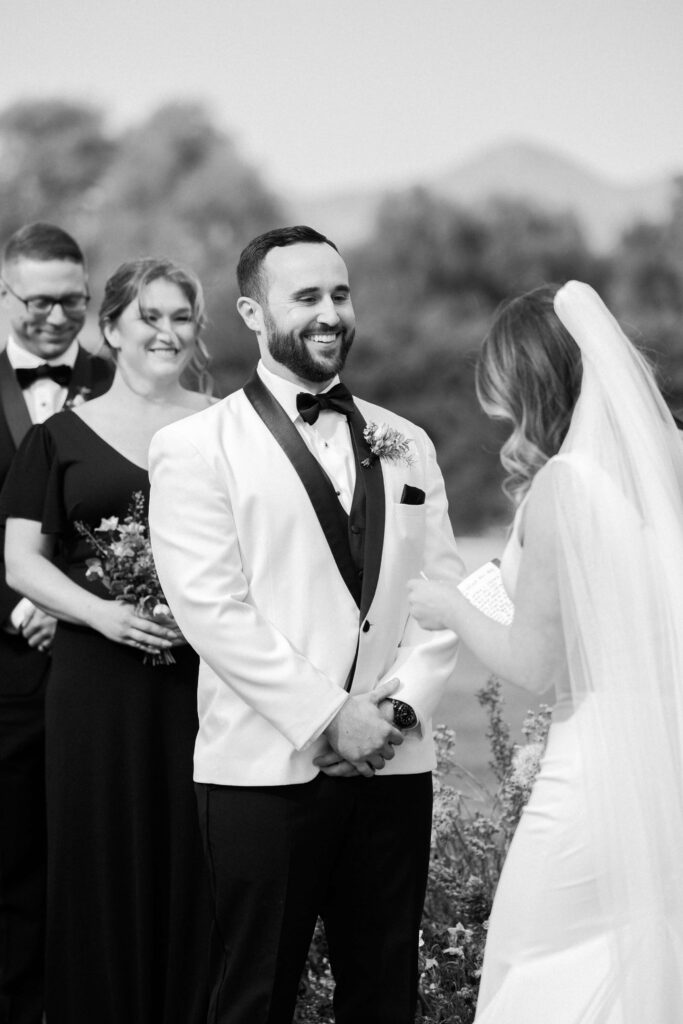 Roblar Farm Ceremony Groom laughing - Lisa Leanne Photography